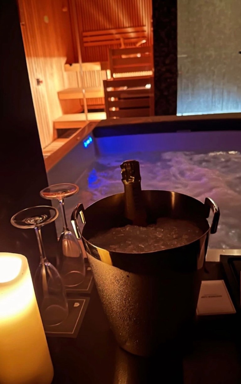 Champagne beside the spa pool and sauna at the Lausanne hotel